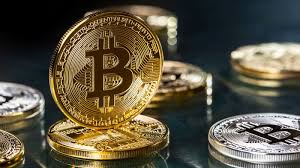 Bitcoin mining rig operating within a hosting center